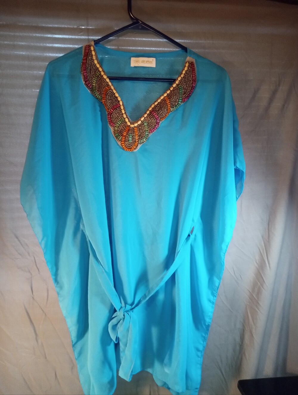 Le Soleil Turquoise Beaded V-Neck Women’s Top